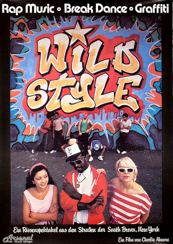Plakat, drei Tänzer vor einer Graffiti-Wand 'Wild Style'